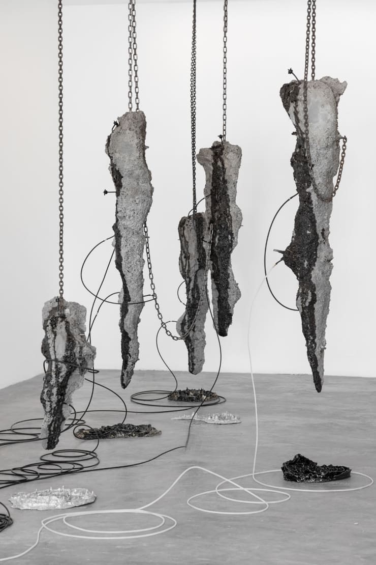 Tomás Díaz Cedeño 1000 años, 2019 Five concrete sculpture installation, floor water pump, ceramics.