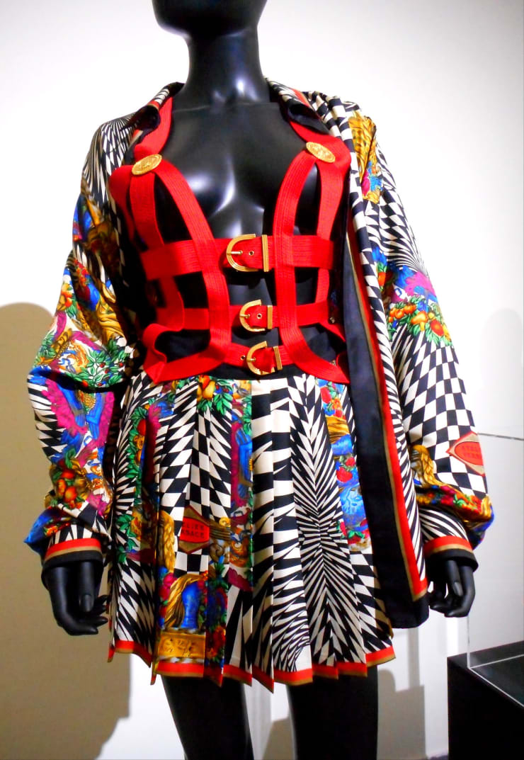 Designer Giovanni Versace was a collector and admirer of Victor Vasarely’s work. "'Dialoghi Dissing / Gianni Versace - Magna Grecia Tribute' exhibition up to September 20, 2017 at Archaeological Museum of Naples" by Carlo Raso is marked with Public Domain Mark 1.0.