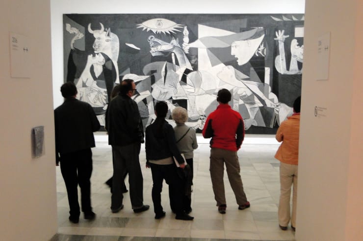 Visitors View Picasso's Guernica - Museo Reina Sofia - Madrid, Spain, May 12, 2010 by Adam Jones, Ph.D. - Global Photo Archive is licensed under CC BY-SA 2.0.
