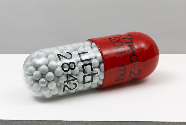 Damien Hirst Theo-24 300mg ucb2852, 2014 Polyurethane resin with ink pigment, PETG vacuum formed shell filled with white glass marbles 12L X 4.25D in. Edition of 30
