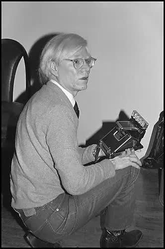 Bobby Grossman ANDY WARHOL WITH POLAROID SX70, THE FACTORY, 1979 Chromogenic Print On Plexiglas 30 x 20 ins 76.2 x 50.8 cm Available at VFA