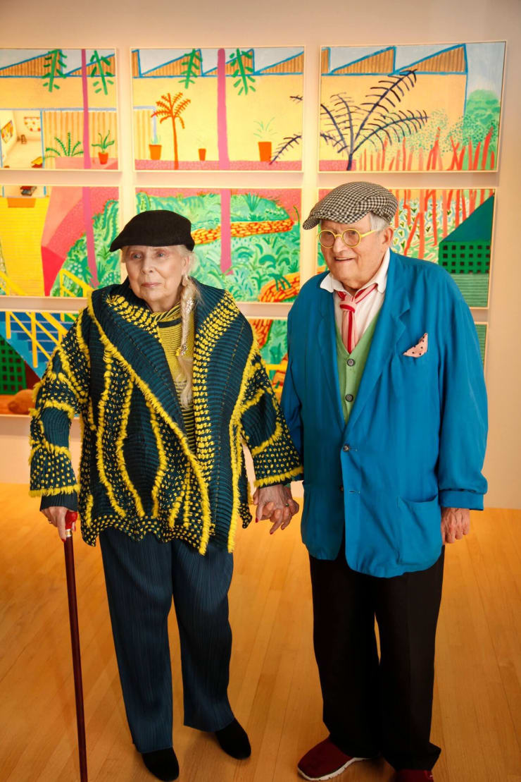 Joni Mitchell and David Hockney at L.A. Louver gallery in Los Angeles "From Valentine's Day this year – that viral photo of Joni Mitchell and David Hockney holding hands at the LA Louver gallery in California. Pic by Jacob Sousa." by Fresh On The Net is licensed under CC BY 2.0.