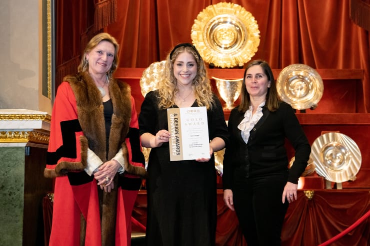 Kayla Rimmon receiving her award from Joanna Hardy & Pia Tonna. GCDC Awards 2023 in Goldsmiths Hall