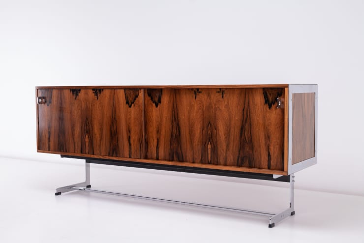 Richard Young Sideboard, 1972 Rio rosewood veneer, chrome plated steel details. Produced by Merrow Associates, England. diagonal view