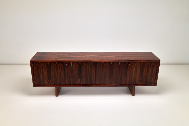 Martin Hall Sideboard, 1972 Brazilian rosewood veneer, maple interior lining Made by Gordon Russell, labelled accordingly. front view
