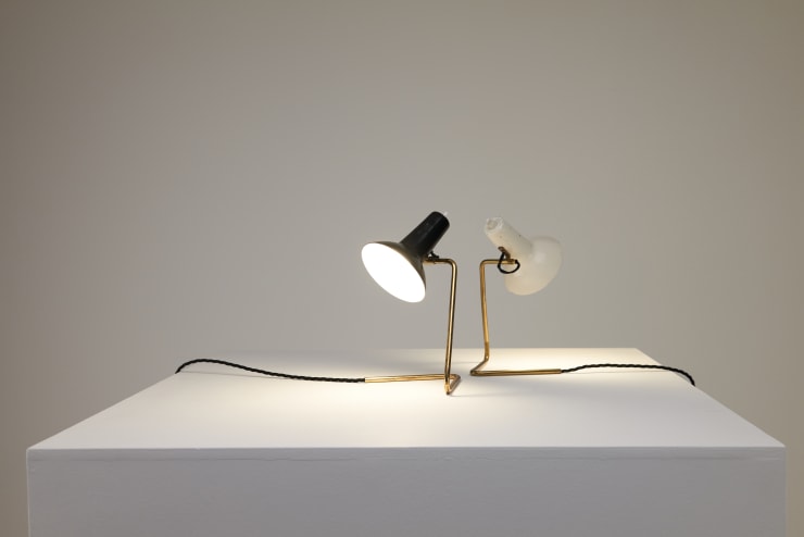 A Pair of Gino Sarfatti, Table / Wall Lamps Model 551 , 1952 Black and White, Brass, painted aluminium Made by Arteluce, Italy Partial labels on both lamps