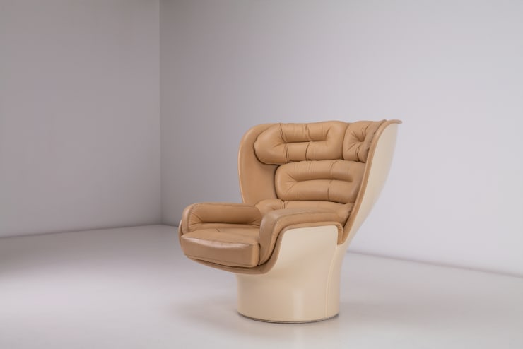 a Joe Columbo Elda Chair, 1963 Moulded fiberglass body with leather upholstery Produced by Comfort, Italy. Pictured diagonally