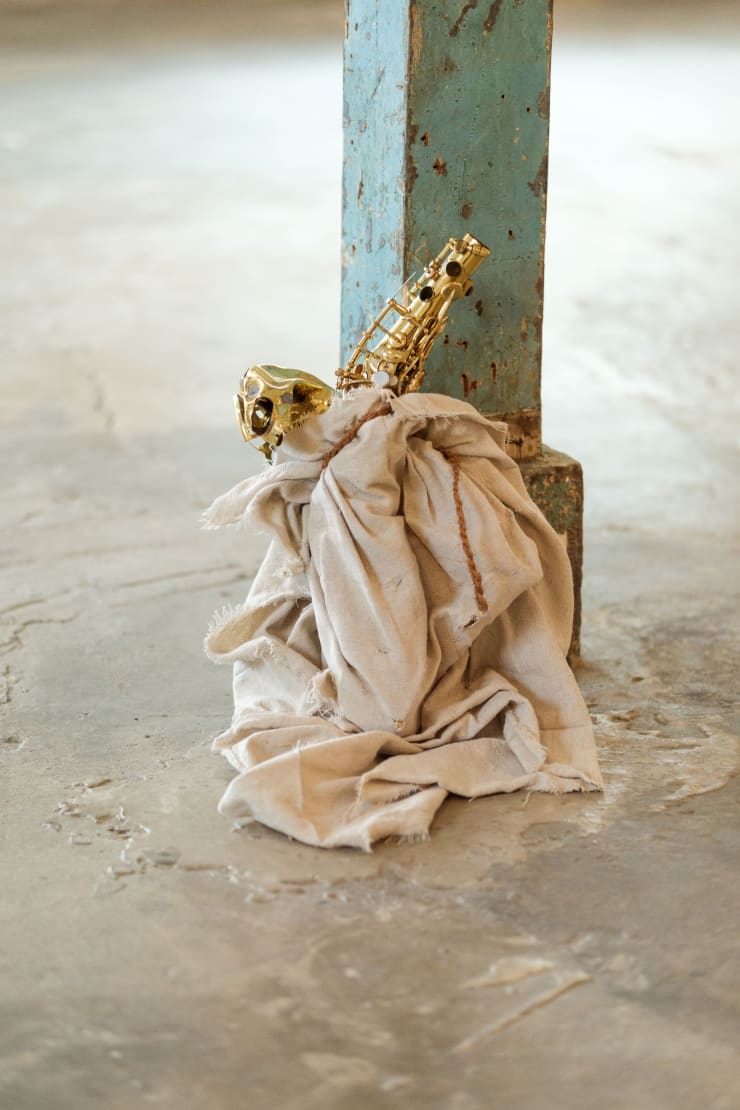 Jeremy Toussaint-Baptiste, Gris-Gris 2, 2024, Alto saxophone, canvas, rope, dimensions variable.
