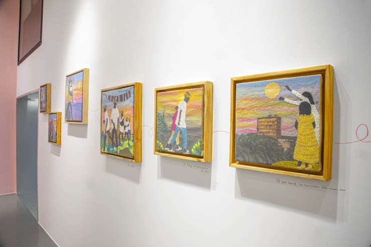 Joana Choumali's playful display. the red link embodies the human bonds. La terre n'a qu'un Soleil at GALERIE FARAH FAKHRI, Abidjan, Côte d'Ivoire