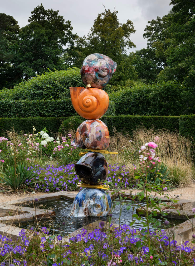 A Cosmic Reset, 2024, Glazed stoneware, gold leaf, hardwood (Oak, Cherry, Beech), varnish, paint, two-part epoxy, water pump, fountainhead, stainless steel, 300 x 290 x 290 cm