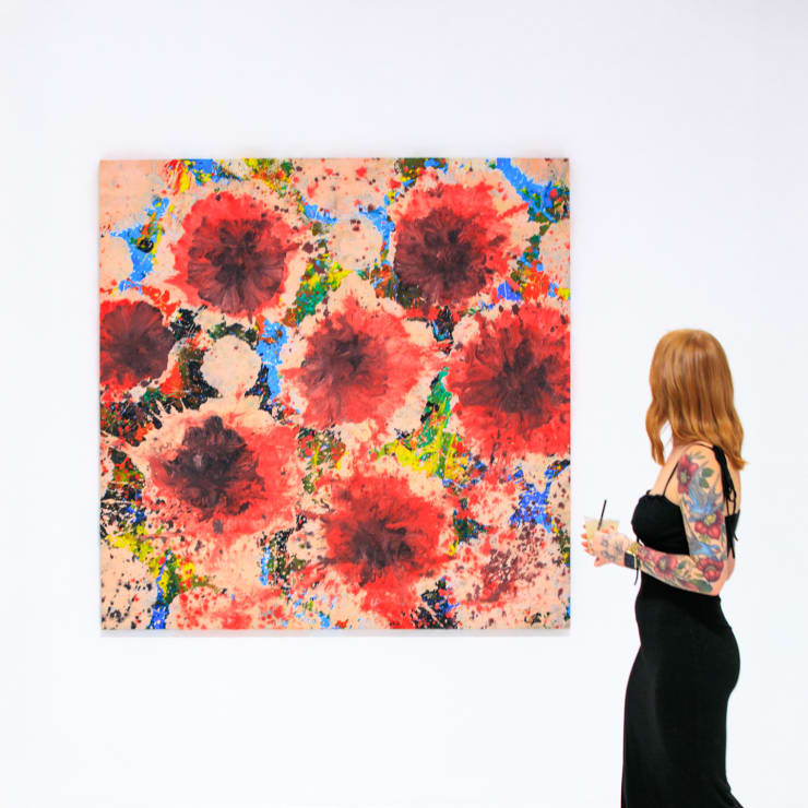 Jorge Luis Santos abstract painting with a guest at Square One Gallery