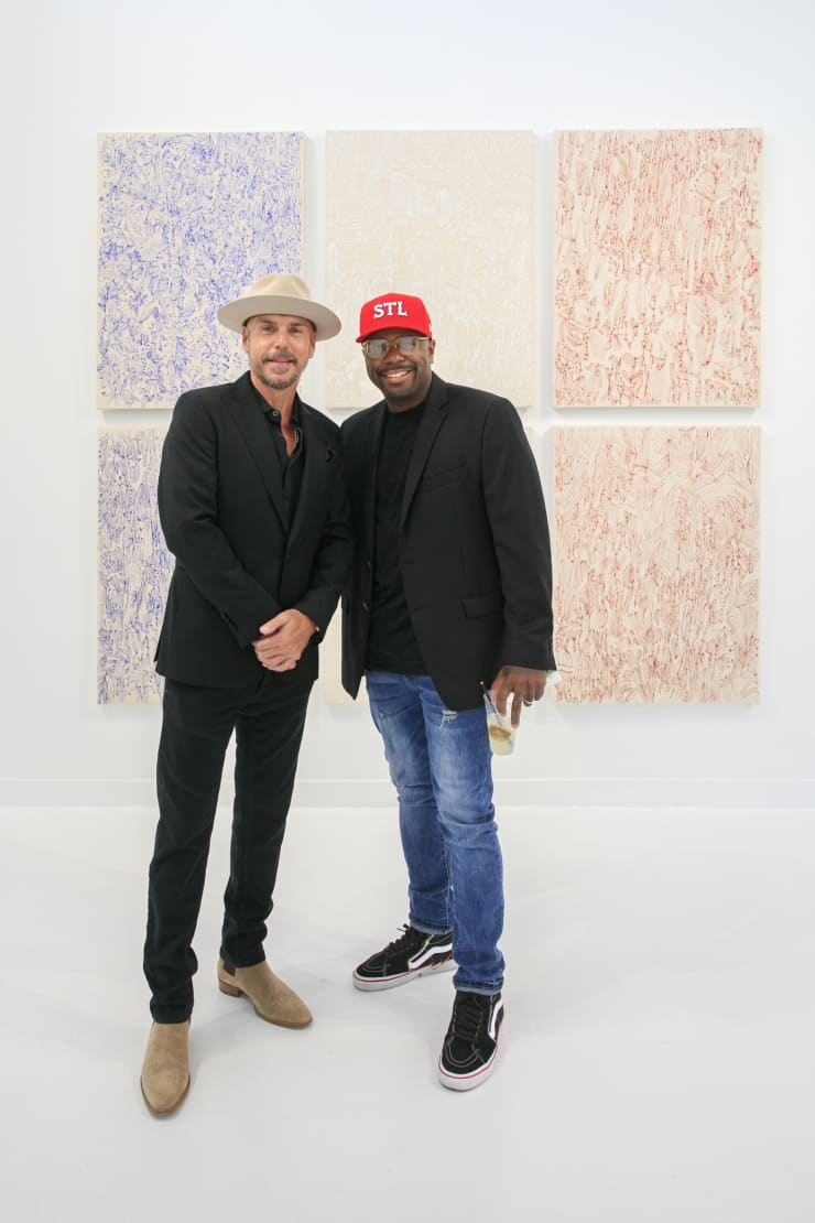 Guests at the opening reception of "Tiger Moth", a solo exhibition by Sarah Giannobile. Photo by Suzy Gorman