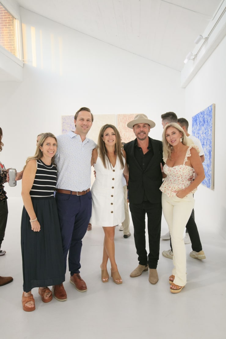 Guests at the opening reception of "Tiger Moth", a solo exhibition by Sarah Giannobile. Photo by Suzy Gorman