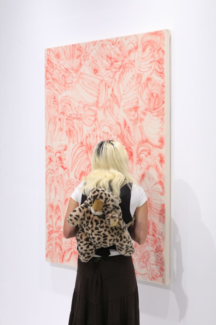 Guests at the opening reception of "Tiger Moth", a solo exhibition by Sarah Giannobile. Photo by Suzy Gorman