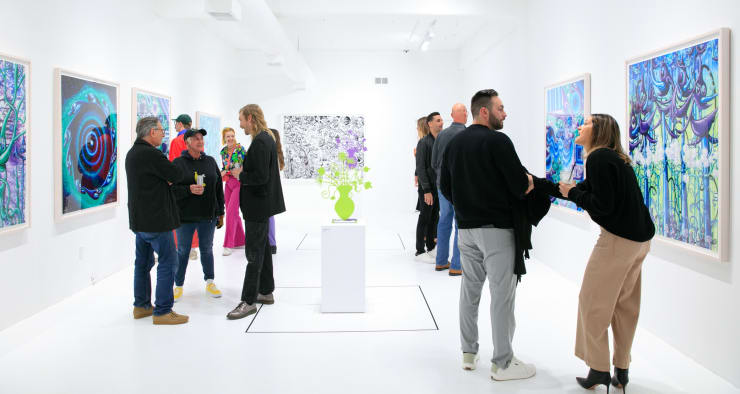 Guests at the opening reception for Dan Alva's "Something Out of Nothing" & Kenny Scharf's "Woodz 'N Thingz" presentation