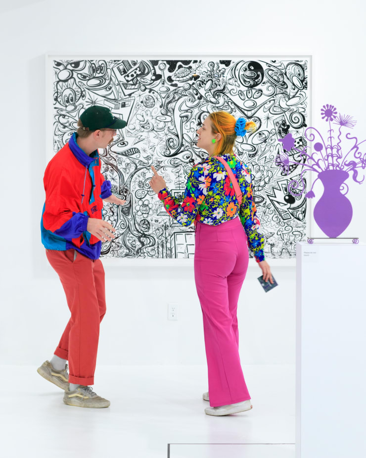 Guests at the opening reception for Dan Alva's "Something Out of Nothing" & Kenny Scharf's "Woodz 'N Thingz" presentation