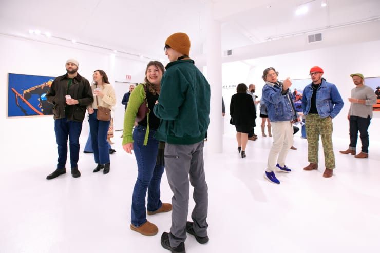 Guests at Jeremy Booth's solo exhibition "Sweat & Blood" opening reception