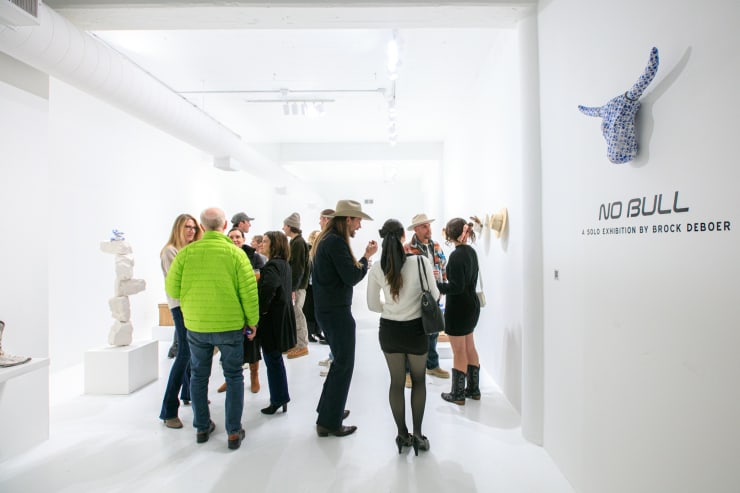 Guests at Brock DeBoer's solo exhibition "No Bull" opening reception