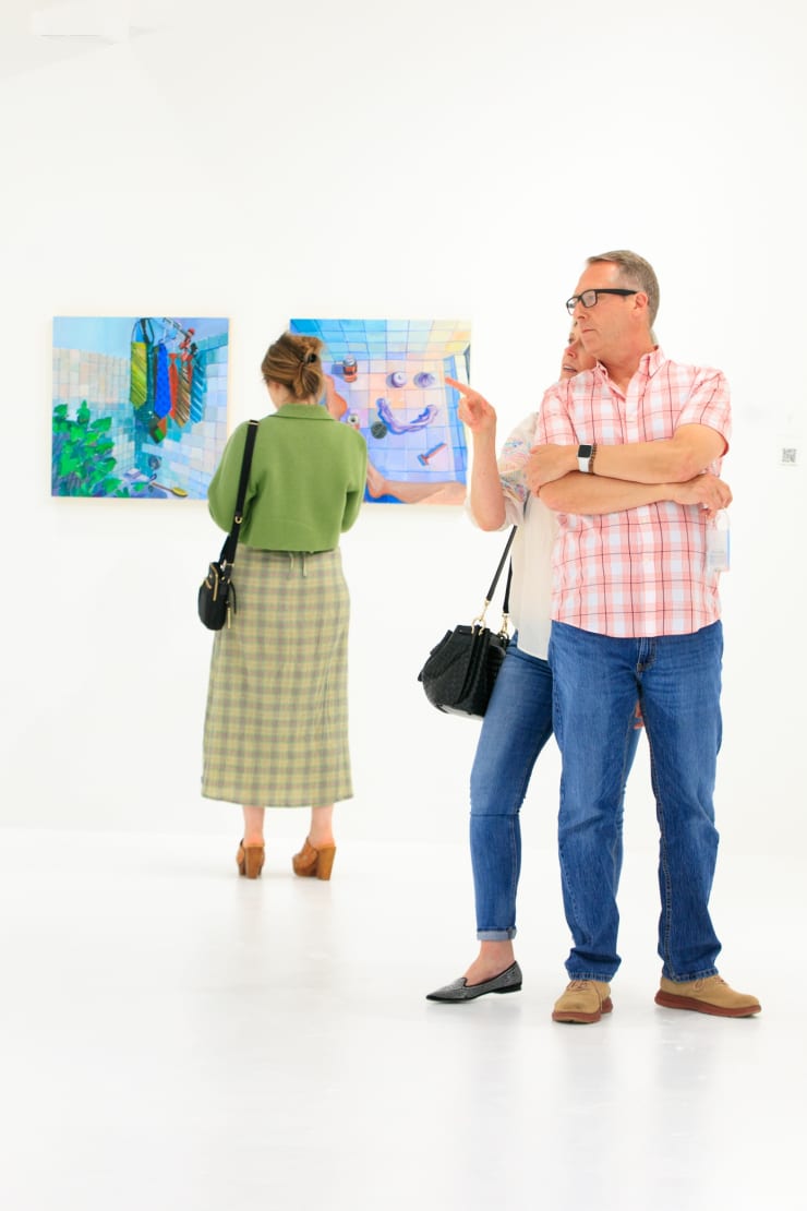 Guests at Erika Lee Sears "Lemons to Olives" exhibition