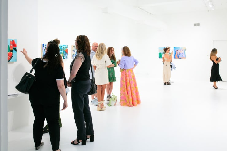 Guests at Erika Lee Sears "Lemons to Olives" exhibition