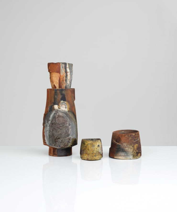 Lidded vessel with cups