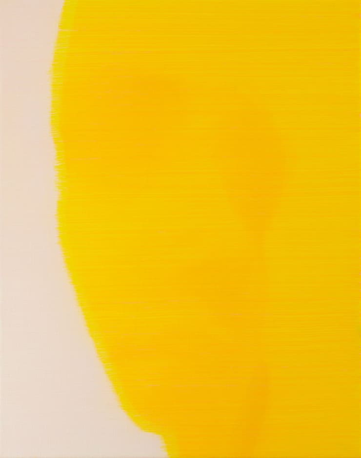 bright yellow of human profile with embedded second face