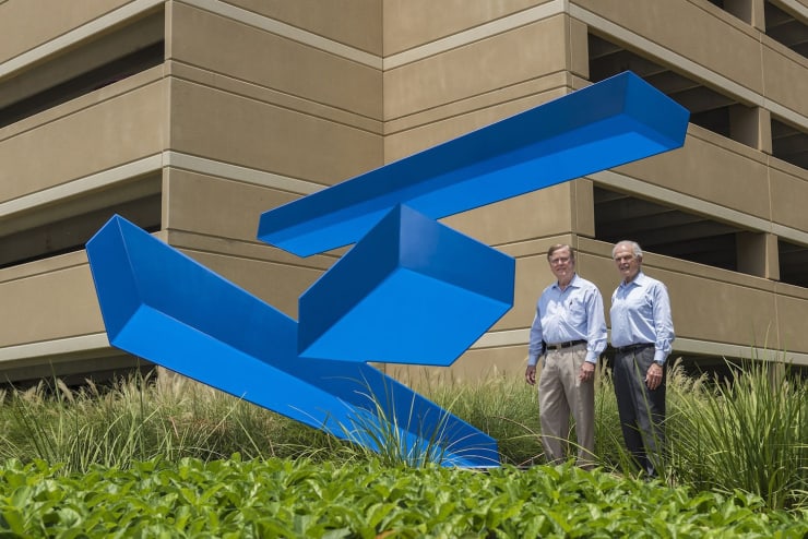 Robert Heineman (left), Vice President of Planning, and Peter Doyle (right), Executive Vice President of Strategic Development, both with The Howard Hughes Corporation, have orchestrated selections of the various sculpture pieces for Hughes Landing with the assistance of Kinzelman Art Consulting.