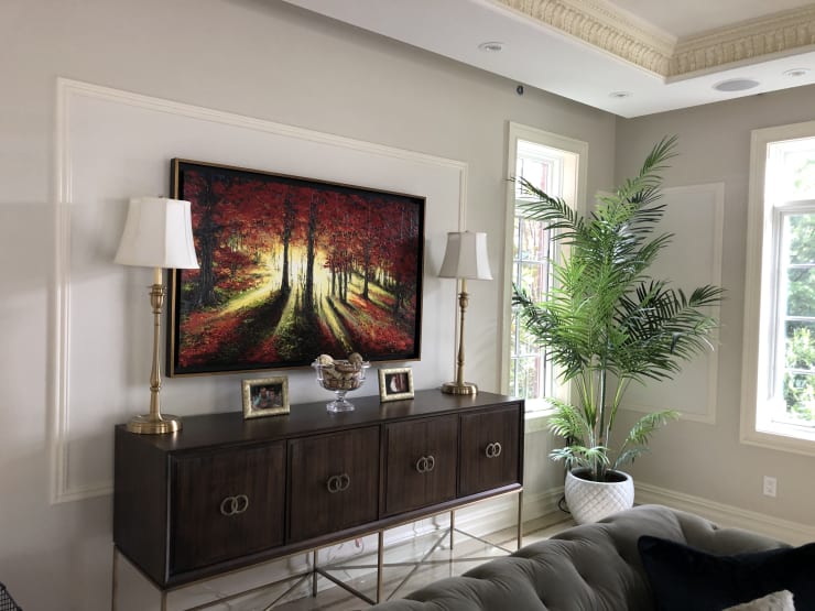 Photo of artwork hanging in a living room