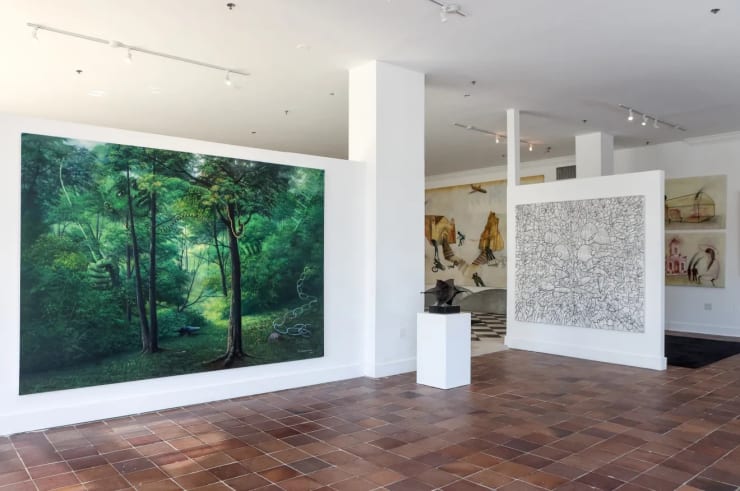 From left, a work by Omar Diaz Guardarrama, "Guiding Mother Nature", and Maximo Caminero's "En el centro de las creencias" at Evey Fine Art Gallery