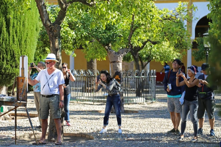 Gerard Byrne sketching plein air Patio de Naranjos, Cordoba Mosque Cathedral, Spain