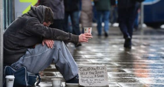 A homeless man. Westmoreland Street in Dublin. Photo credit The Irish Times / Alan Betson