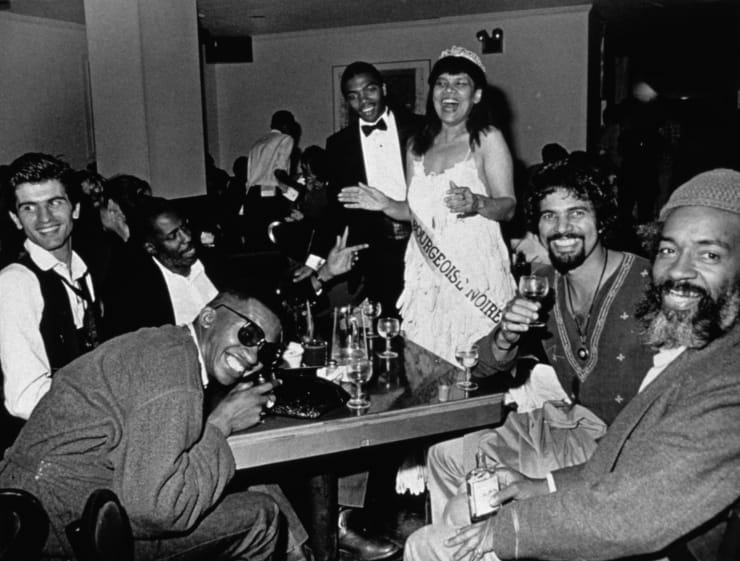 Lorraine O'Grady. Mlle Bourgeoise Noire celebrates with her friends, from Mlle Bourgeoise Noire Goes to the New Museum, 1980–83/2009. Silver gelatin fiber photograph.