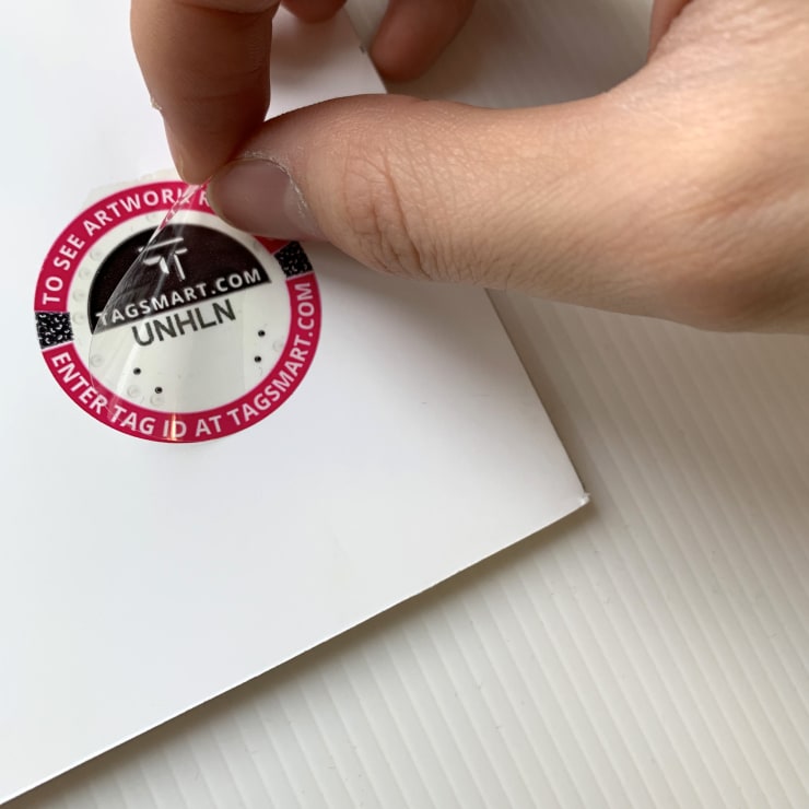 Limited Edition seal being applied to a photograph