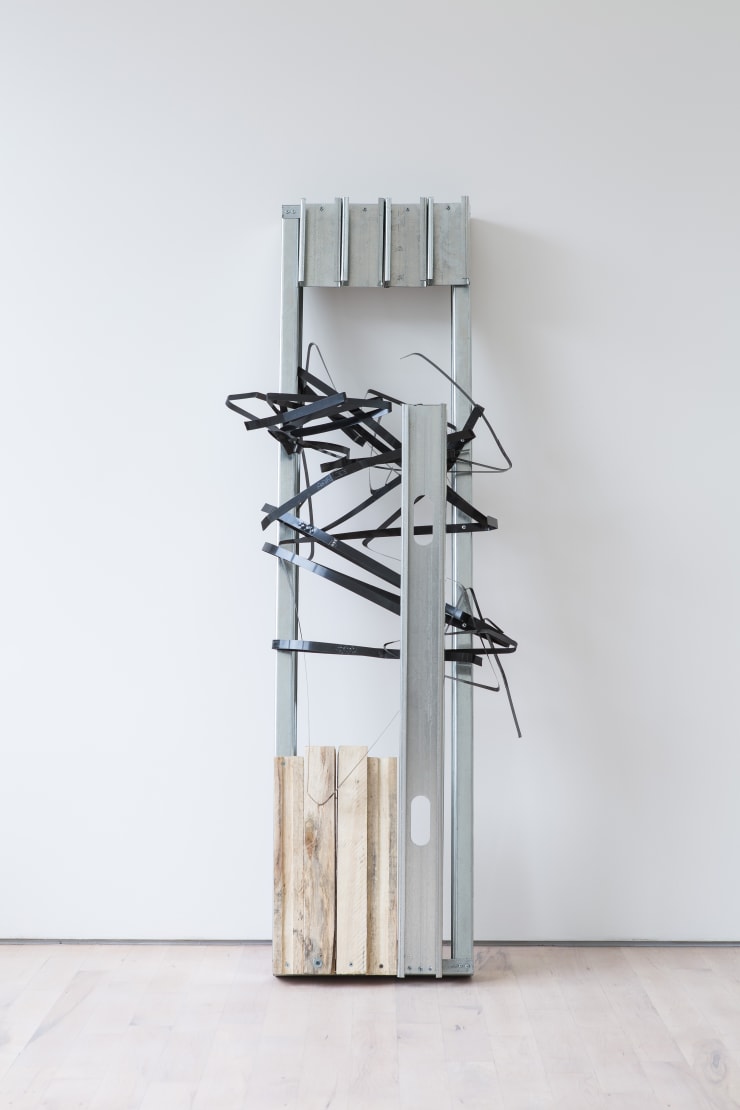 Allyson Vieira Clad (The City Wall) III, 2013 Steel, screws, The City Wall scraps 163 x 40 x 40 cm