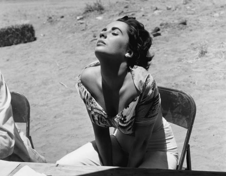 Sid Avery - <em>James Dean Close up with a Bolex Camera on the Set of "Giant"</em>, 1955