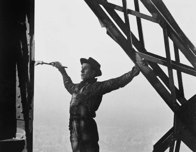 Marc Riboud - <em>The painter of the Eiffel Tower, Paris</em>, 1953