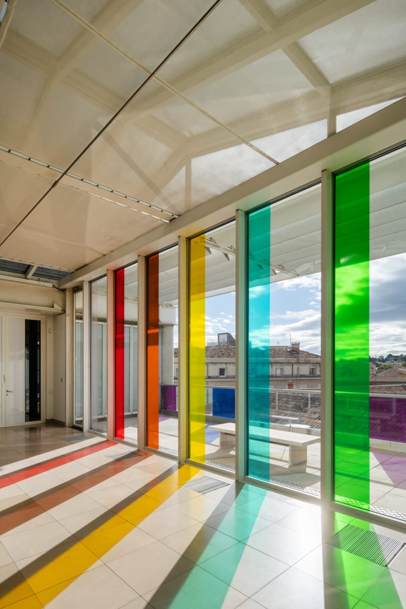 Gerard & Kelly Relay, 2018 Transparent vinyl on windows (9 colors) Dimensions variable Edition of 5