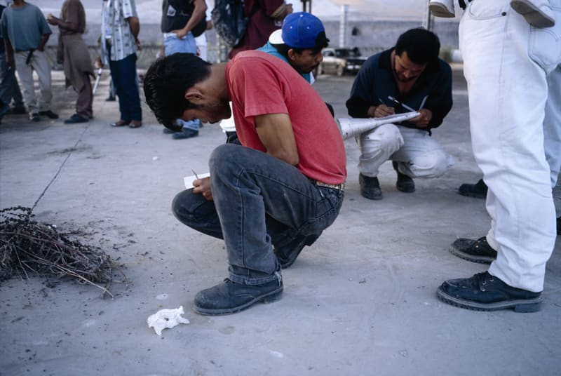 Allan Sekula Metal-workers employed by a Hyundai subcontractor signing authorization papers for an independent union, Tijuana from 'Dead Letter Office',...