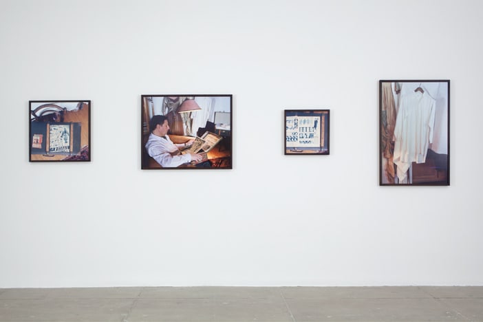 Jeff Wall Authentication. Claus Jahnke, costume historian examining a document pertaining to an item in his collection, edition of 4...
