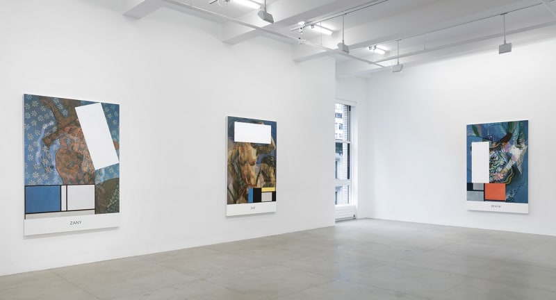 3 large colorful paintings with text, images and geometric shapes hang in a white gallery space with 1 window.