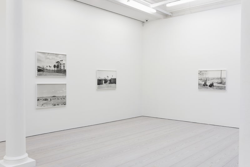 installation view of photographs by An-My Le