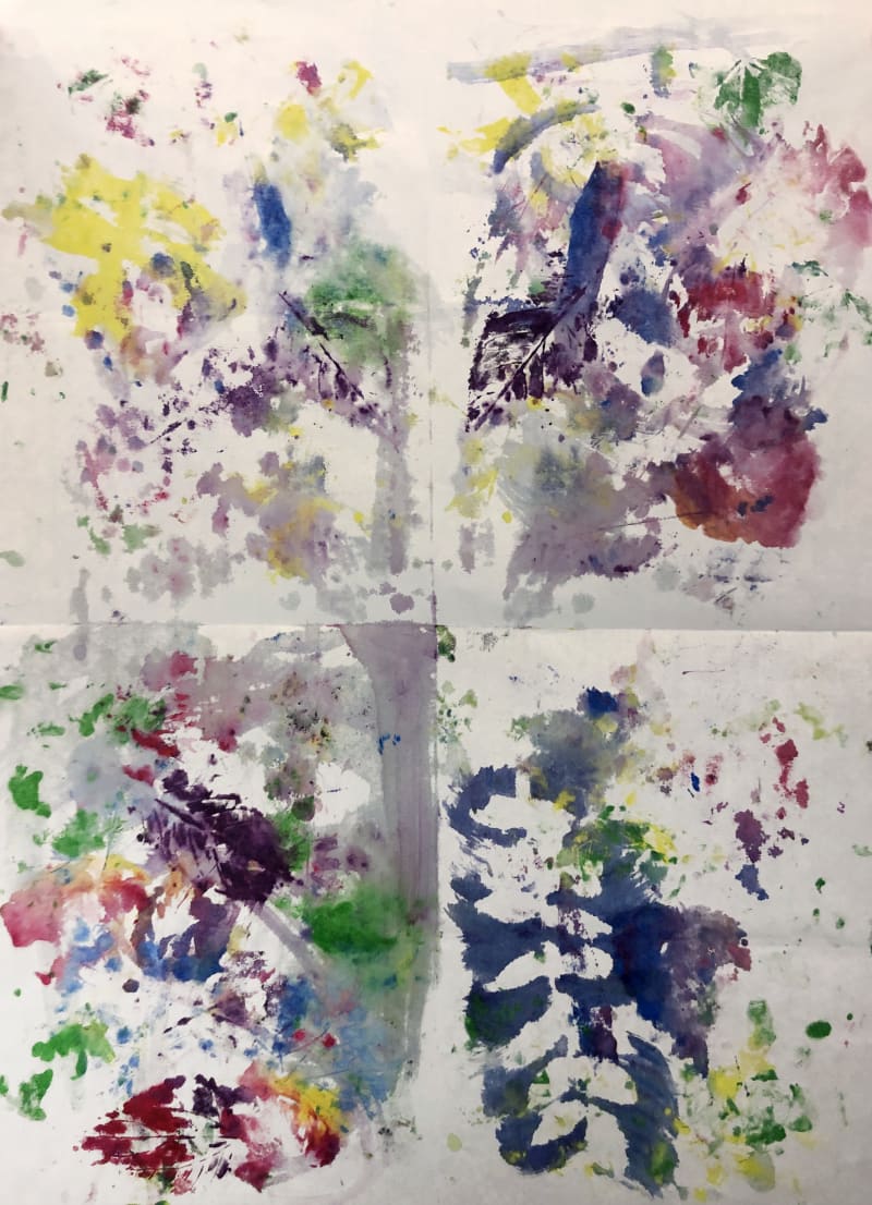 A colorful abstract painting utilizing prints of leaves