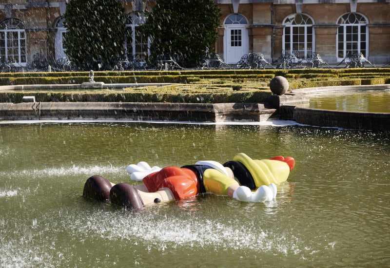 Pinocchio laying face down in a pool