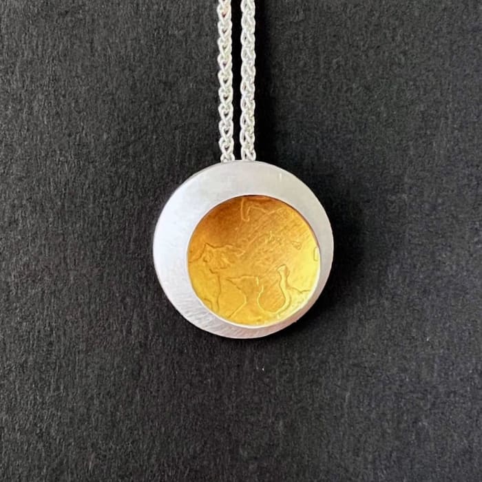 Hannah Souter, Small gilt etch pendant, 2024