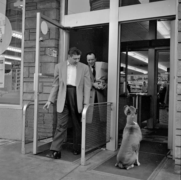 Vivian Maier, Untitled (Men with dog) n.d.