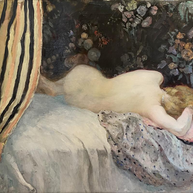 A painting of a nude woman, seen rom behind, lying on a bed which is partially hidden behind a drape
