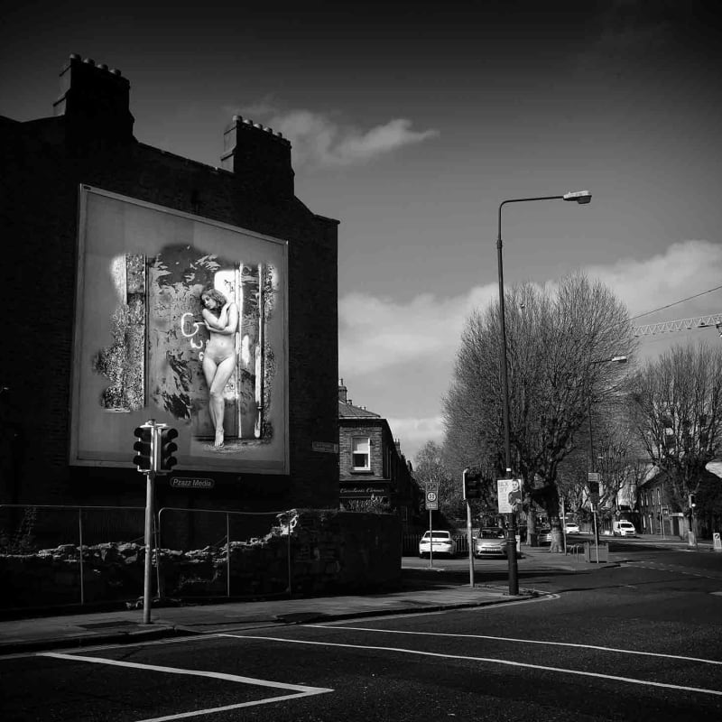 <p>During the Covid - 19 First Lockdown in Dublin City, Ireland. A virtual image on an advertising billboard, in an empty city street.</p><p>Images from Eamonn Farrell's The Naked City Virtual Exhibition for Dublin Culture Night 2020.</p>