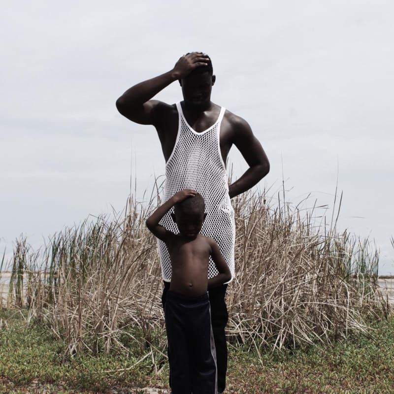 Photograph by Nana Yaw Oduro showing a dad and his son