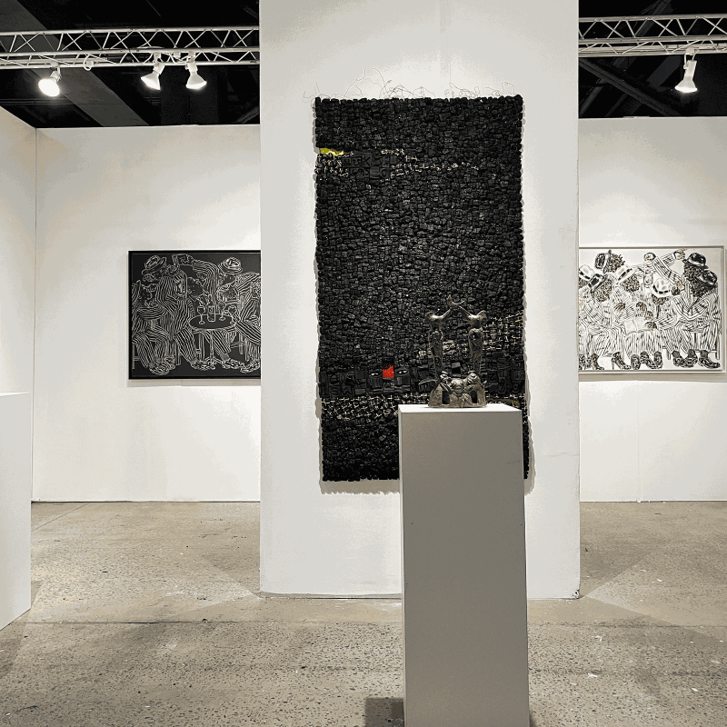 View of AFIKARIS Gallery at 1-54 New York in Chelsea. Salifou Lindou, Eva Obodo and Hervé Yamguen
