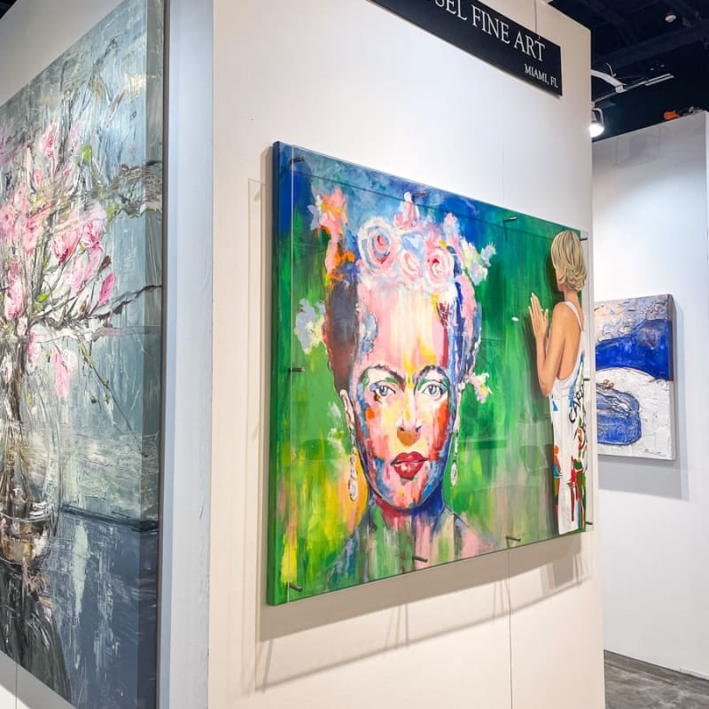 Paintings displayed at Carousel Fine Art's booth at the Palm Beach Show art fair, 2023.